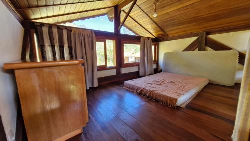 Postel nebo postele na pokoji v ubytování Casa Recanto CAEJÔ