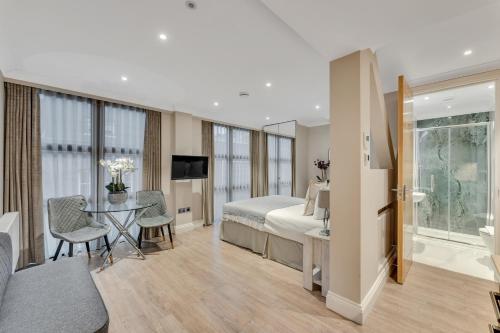 Televiisor ja/või meelelahutuskeskus majutusasutuses Cleveland Residences Farringdon