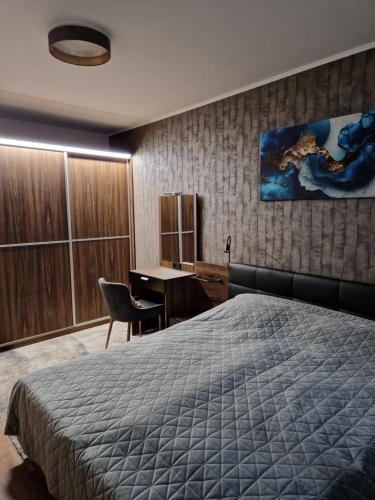 Ένα ή περισσότερα κρεβάτια σε δωμάτιο στο Tameli Delux Apartman