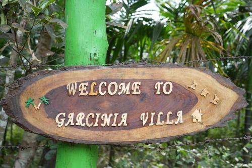 a sign that says welcome to gacaragola vista at Garcinia Villa in Sirsi