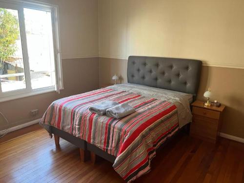 Postel nebo postele na pokoji v ubytování HOSTAL QUINTAMAR 6 Norte 985