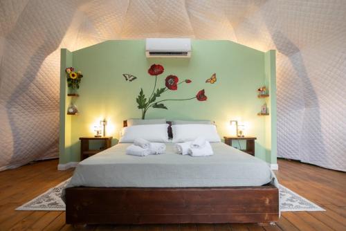 En eller flere senge i et værelse på The Land Before Time - Quad & Saddle Retreats