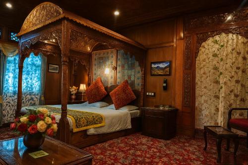 a bedroom with a canopy bed in a train at Crown Of India Group Of Houseboats in Srinagar