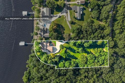 an aerial view of an island in the water at Bluebird Sanctuary w Stunning Sunset Views Sleeps 28 in Big Sandy