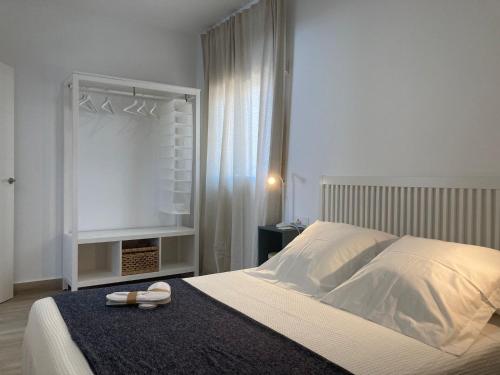 Postel nebo postele na pokoji v ubytování Zona5 Apartamentos Turísticos