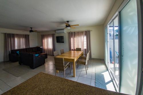 a living room with a table and a couch at Casa Costamar 