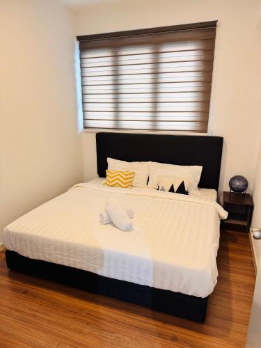 Ένα ή περισσότερα κρεβάτια σε δωμάτιο στο M Vertica Residence in KL