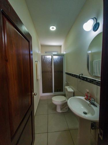 a bathroom with a toilet and a sink at Casa Costamar 