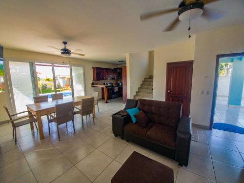 a living room with a couch and a table at Casa Costamar 