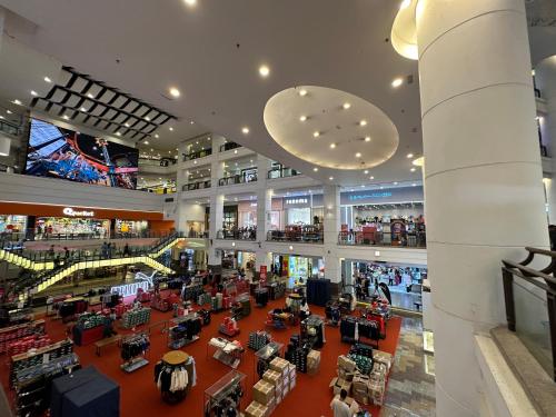 an image of a shopping mall with people in it at Luxy Service Apartment at Times Square KL in Kuala Lumpur