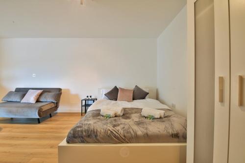 Katil atau katil-katil dalam bilik di Modern & Bright Central Swansea Studio
