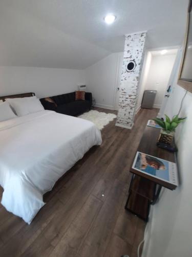 Ένα ή περισσότερα κρεβάτια σε δωμάτιο στο Zora's Sojourn