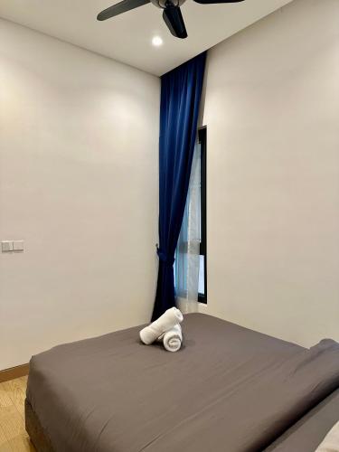 Katil atau katil-katil dalam bilik di Lucentia residence BBCC Lalaport by smart services