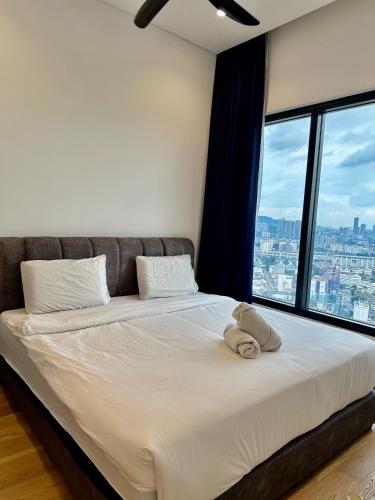 Katil atau katil-katil dalam bilik di Lucentia residence BBCC Lalaport by smart services
