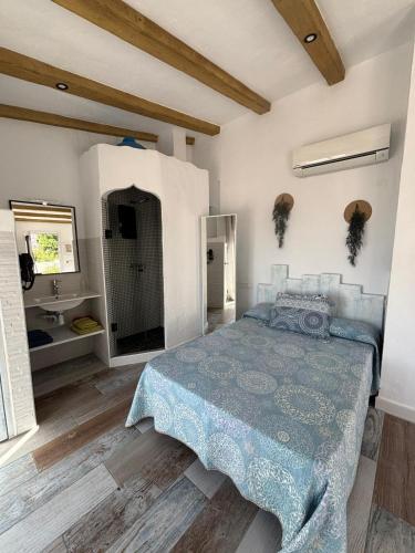 Ένα ή περισσότερα κρεβάτια σε δωμάτιο στο Villa Chorrete