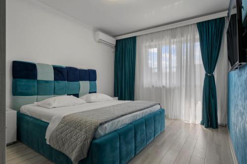 Ένα ή περισσότερα κρεβάτια σε δωμάτιο στο The blue Norwegian house