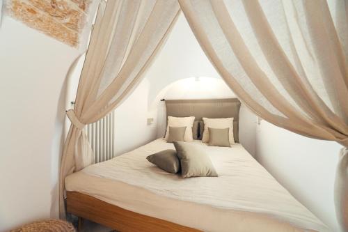 Ένα ή περισσότερα κρεβάτια σε δωμάτιο στο Trullo Anteros