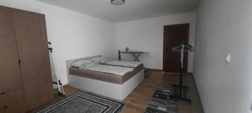 Ένα ή περισσότερα κρεβάτια σε δωμάτιο στο Apartment Real 1