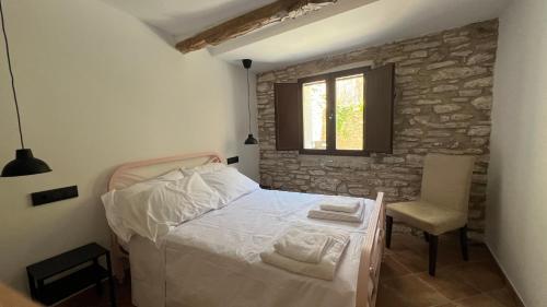 Ένα ή περισσότερα κρεβάτια σε δωμάτιο στο La casa de la tía Guille