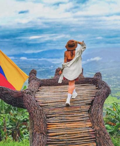 a figurine of a woman standing on top of a table at Cabaña Rose Mano del Gigante in Gigante