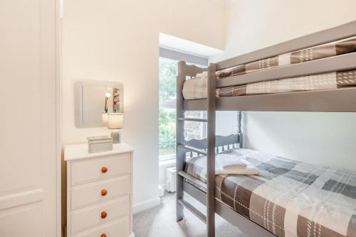 Postel nebo postele na pokoji v ubytování Gwynnant Cottage