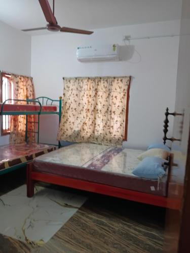 Letto o letti in una camera di Jammu HomeStay
