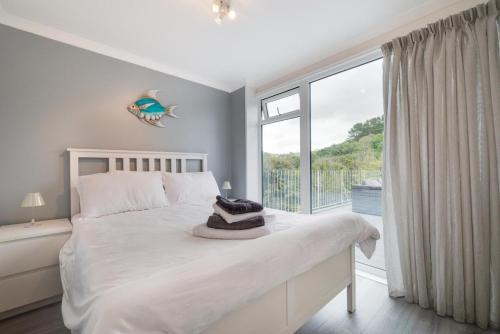 Postel nebo postele na pokoji v ubytování Jacka Shack