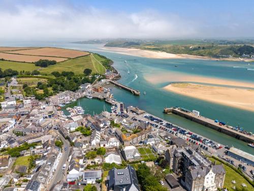 an aerial view of a town next to a body of water at Trailside in Saint Issey
