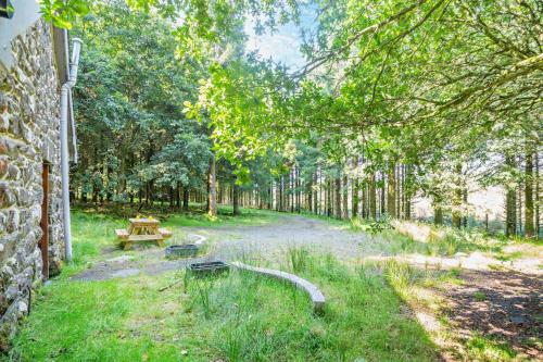 Κήπος έξω από το Woodlands Paradise