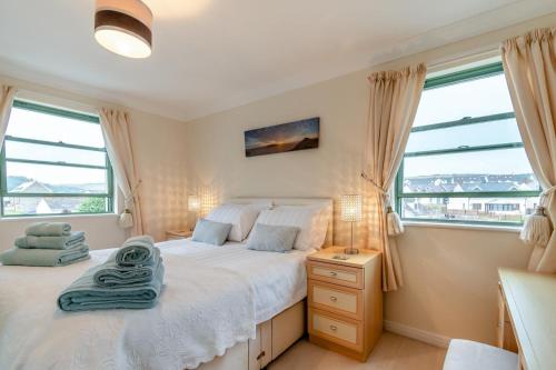 Ένα ή περισσότερα κρεβάτια σε δωμάτιο στο 32 St Brides Bay View Apts