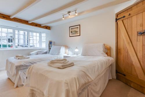 Voodi või voodid majutusasutuse Little In Sight toas