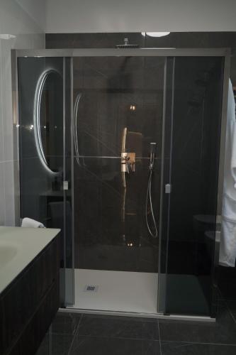 Ένα μπάνιο στο VBM SUITE & SPA Apartments
