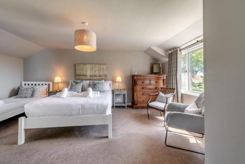 Ένα ή περισσότερα κρεβάτια σε δωμάτιο στο Smithies Cottage