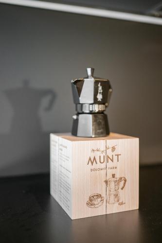 a bottle of nutriloitoitchamoisernessernessernessernessernessernesserness at Munt Dolomiti Farm in Plancios