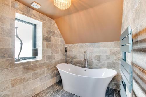 Ένα μπάνιο στο Driftwood Cottage - East Cliff