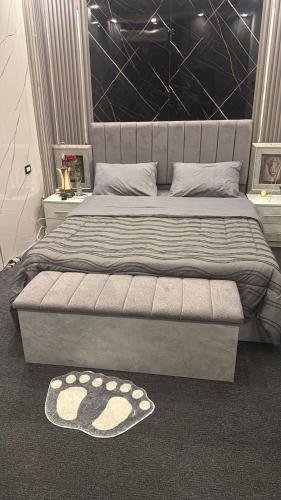 Ένα ή περισσότερα κρεβάτια σε δωμάτιο στο Studio in the Heart of Irbid