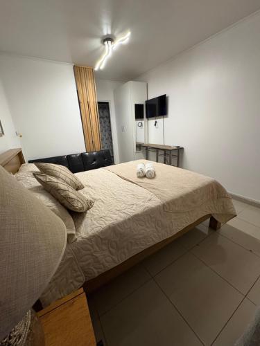 Ένα ή περισσότερα κρεβάτια σε δωμάτιο στο Mini Departamento