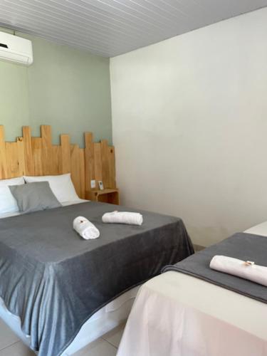 Cama o camas de una habitación en Pousada Bouganvile Atins