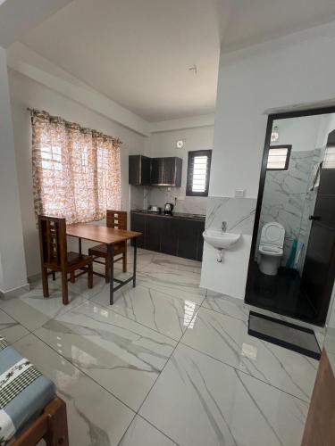 Dapur atau dapur kecil di Gopurathingal studio Apartment Bethel