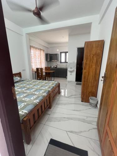 Dapur atau dapur kecil di Gopurathingal studio Apartment Bethel