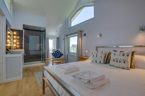 Voodi või voodid majutusasutuse Lower Trenarthan toas