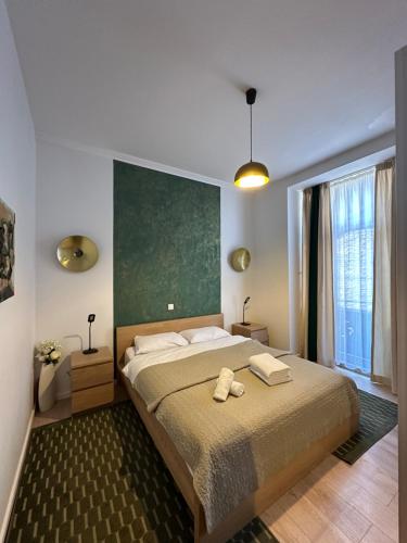 Ένα ή περισσότερα κρεβάτια σε δωμάτιο στο House4You - Balcescu