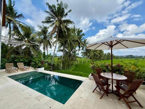 Πισίνα στο ή κοντά στο Ubud Dzen Villa 9