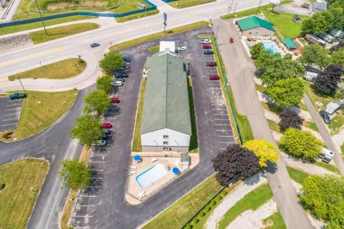 an aerial view of a parking lot with a building at Motel 6-Milan, OH - Sandusky in Milan