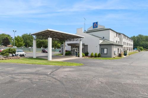 a gas station with a sign on top of it at Motel 6-Milan, OH - Sandusky in Milan