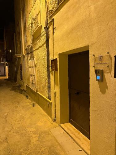 a building with a door on the side of it at La Terrazza in centro in Marsala