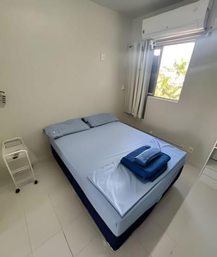 Postel nebo postele na pokoji v ubytování Estúdio próximo ao aeroporto com vaga na garagem