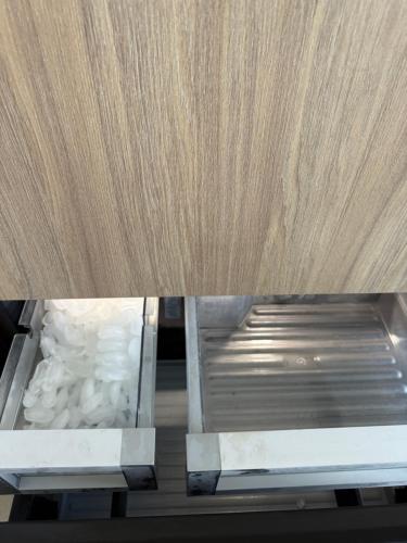 a close up of a wooden table with a drawer at Stunning Lux 2 Bed 2 Bath with Panoramic View from Balcony in Miami