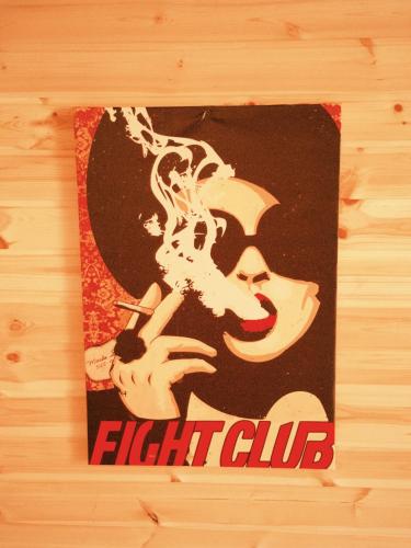 a sign for an eight club on a wooden wall at NitsHouse! in Tsemi