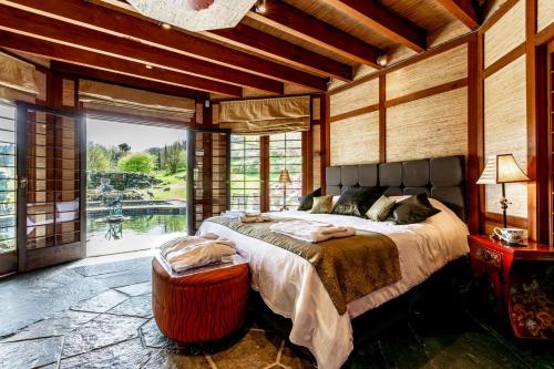 a bedroom with a bed and a large window at 1 Bed in Tollard Royal oc-j32937 in Tollard Royal